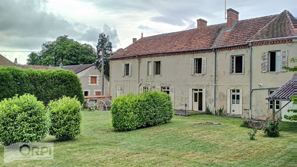 Maison de caractère et son parc en centre-ville