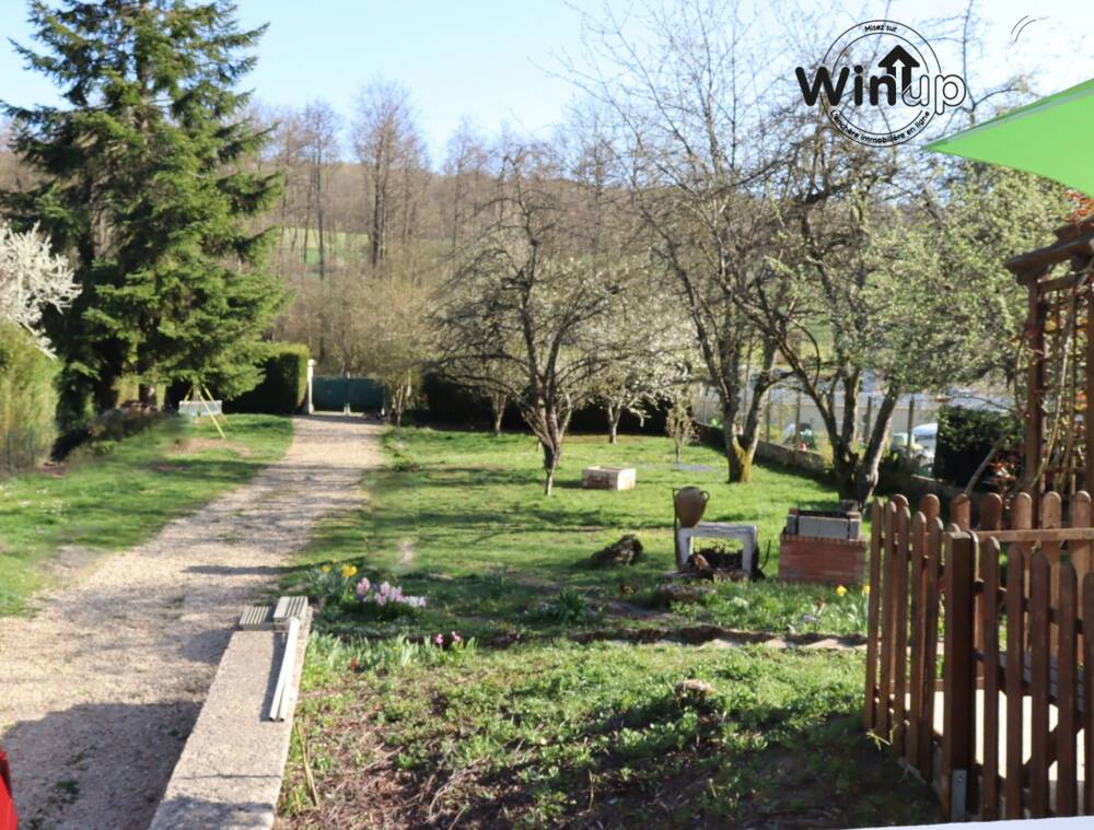 Maison de plain-pied avec sous-sol total sur 1040 m² de terrain