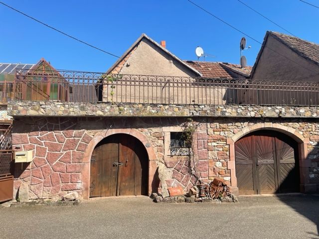 Serez-vous celui ou celle dont l'enchère sera retenue ? Maison avec ensemble garage-atelier