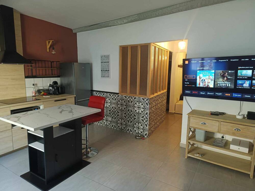 Appartement type 3 neuf + ancien commerce + cave