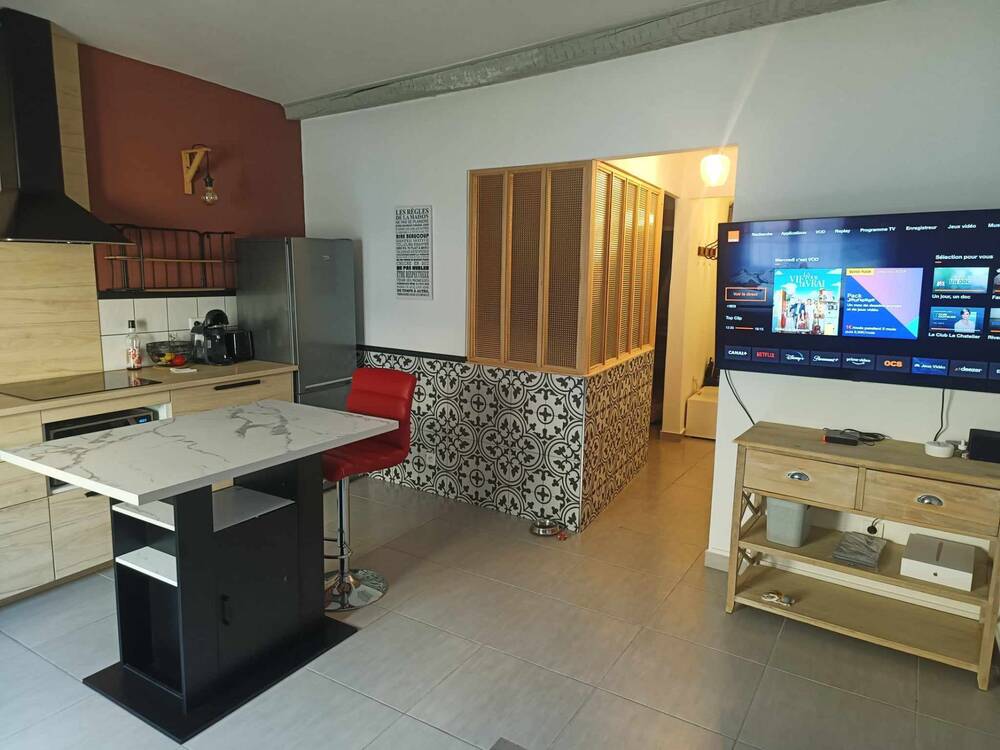 Appartement type 3 neuf + ancien commerce + cave