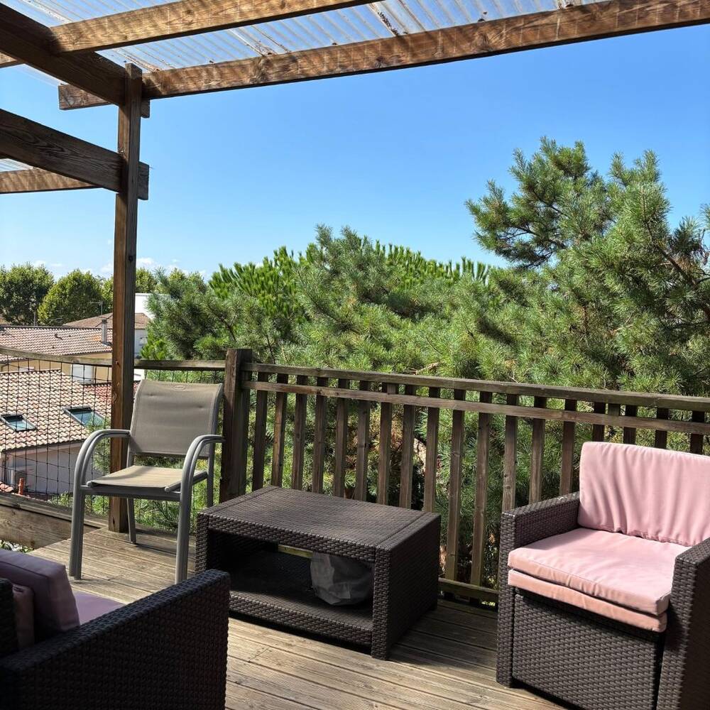 Appartement T4 toit terrasse et place de parking