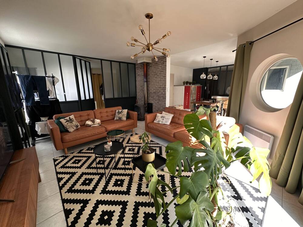 Maison familial dans son écrin de verdure