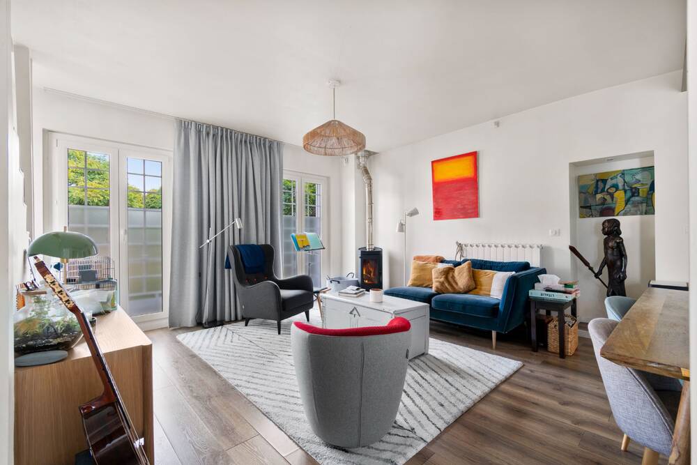 Élégante maison familiale de 103m² (127m² au sol) avec terrasse de 16m² et garage